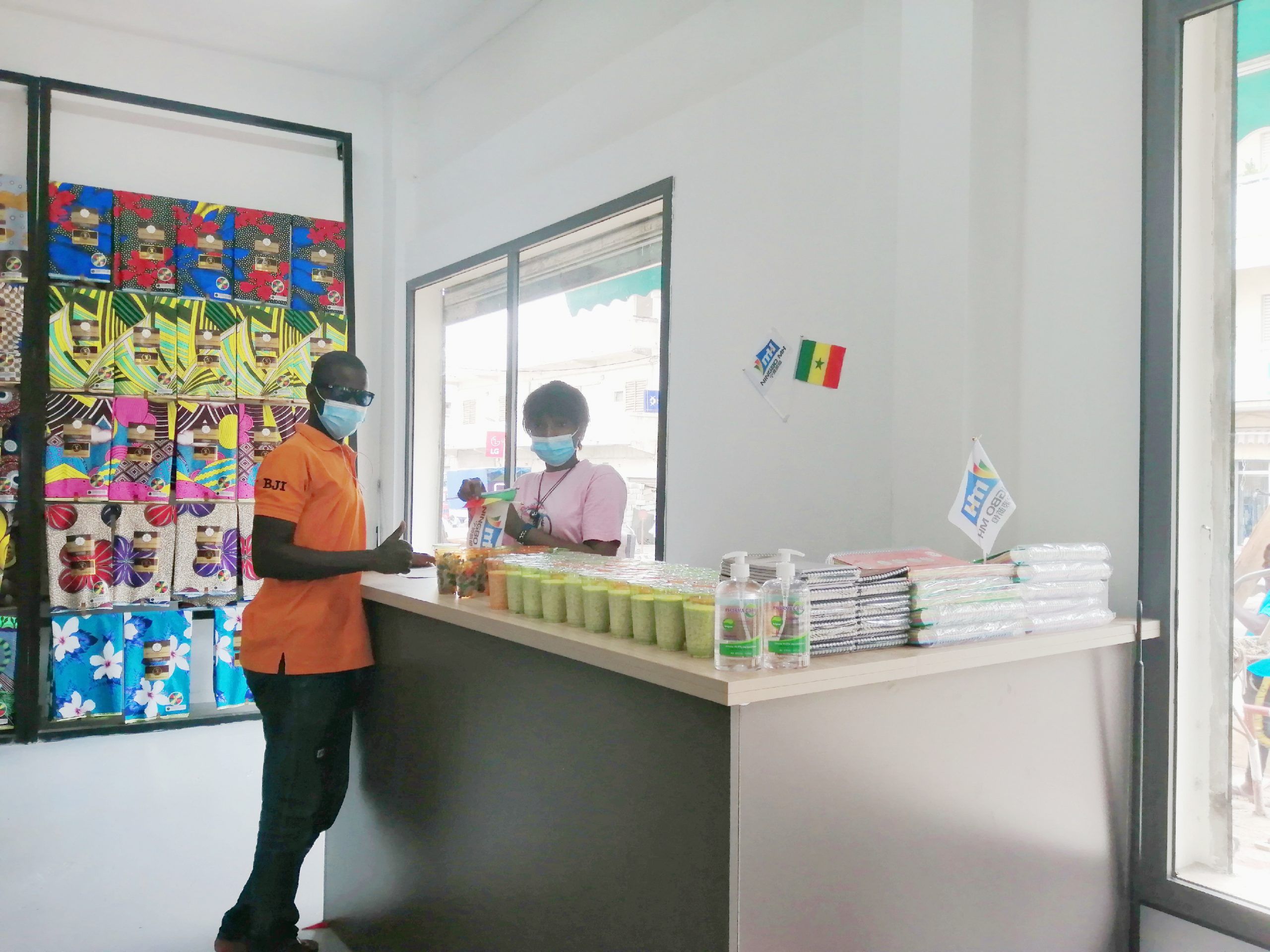 用心澆灌 締造服裝輔料王國 海外塞內(nèi)加爾蠟布/連片店鋪正式開業(yè)